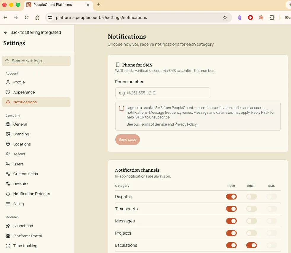 The Notifications settings page in the PeopleCount web app, showing the Phone for SMS card with a phone-number entry field, an unchecked consent checkbox with the full disclosure text and links to the Terms of Service and Privacy Policy, and a disabled Send code button.